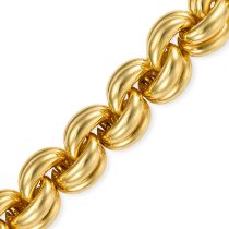 CARTIER, A VINTAGE GOLD BRACELET in yellow gold, formed of a series of stylised curved links, signed