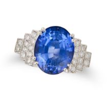 A FINE SAPPHIRE AND DIAMOND DRESS RING set with an oval cut sapphire of approximately 7.74 carats,