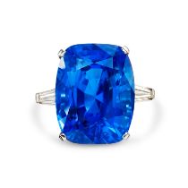 AN EXCEPTIONAL 22.60 CARAT CEYLON NO HEAT SAPPHIRE AND DIAMOND RING set with a cushion cut