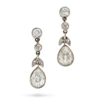 A PAIR OF FINE DIAMOND DROP EARRINGS each comprising a pear cut diamond drop of approximately 0.61