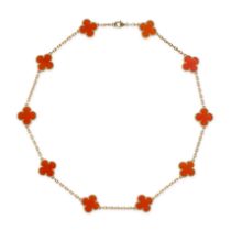 VAN CLEEF & ARPELS, A TEN MOTIF CARNELIAN ALHAMBRA NECKLACE in 18ct yellow gold, comprising ten