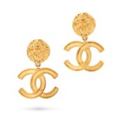 CHANEL, A PAIR OF CC CLIP-ON EARRINGS each comprising a textured circular metal plate suspending an