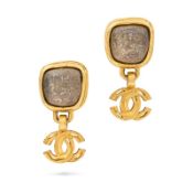 CHANEL, A PAIR OF GREY STONE CC CLIP-ON EARRINGS each comprising a textured gold tone metal earring