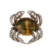 AN ANTIQUE TIGER'S EYE, DIAMOND AND RUBY CRAB CLIP BROOCH designed as a crab, the shell set with pol
