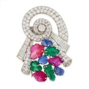 A FINE ART DECO RUBY, SAPPHIRE, EMERALD AND DIAMOND TUTTI FRUTTI CLIP BROOCH, 1930'S the scrolling