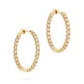 A PAIR OF DIAMOND HOOP EARRINGS each hoop set inside and out with a row of round brilliant cut diamo