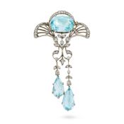 A FINE ANTIQUE EDWARDIAN AQUAMARINE AND DIAMOND BROOCH, CIRCA 1910 the openwork brooch set with a cu