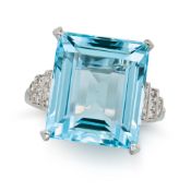 AN AQUAMARINE AND DIAMOND RING set with a rectangular step cut aquamarine of 12.02 carats, the stepp