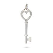 TIFFANY & CO., A DIAMOND HEART KEY PENDANT designed as a key with a heart shaped handle, accented by