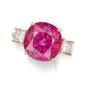 A RUBELLITE TOURMALINE AND DIAMOND RING in 18ct yellow gold, set with a cushion cut rubellite tourma