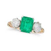 A FINE 1.81 CARAT COLOMBIAN MINOR EMERALD AND DIAMOND THREE STONE RING set with an octagonal step cu