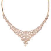 A PINK DIAMOND NECKLACE the scrolling necklace set with one thousand and twenty two round brilliant