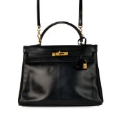 NO RESERVE - HERMÈS BLACK BOX CALF KELLY RETOURNE 32 BAG Condition grade C+. Black Box Calf leath
