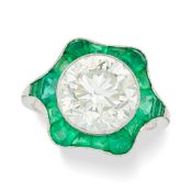 NO RESERVE - AN EXQUISITE DIAMOND AND EMERALD DRESS RING set with an old European cut diamond of app