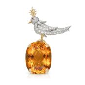 SCHLUMBERGER FOR TIFFANY & CO., A CITRINE, DIAMOND AND RUBY BIRD ON A ROCK BROOCH in 18ct yellow gol