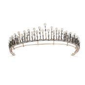 A FINE ANTIQUE NATURAL SALTWATER PEARL AND DIAMOND TIARA in yellow gold and silver, comprising a gra