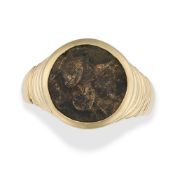BULGARI, AN ANCIENT COIN MONETE RING in 18ct yellow gold, set with an ancient Greek coin within a fl