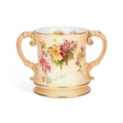 A LARGE ROYAL WORCESTER TWO-HANDLED CUP