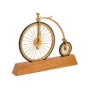 A BRASS MODEL OF A ‘PENNY FARTHING’