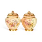 A PAIR OF ROYAL WORCESTER POT POURRI VASES AND COVERS