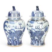 A PAIR OF CHINESE JARS AND COVERS