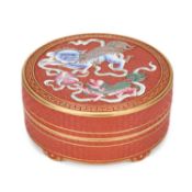A CHINESE PORCELAIN ‘CINNABAR LACQUER’ CIRCULAR BOX AND COVER