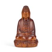 A CHINESE CARVED HARDWOOD FIGURE OF GUANYIN
