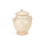 A CHINESE EARTHENWARE JAR AND COVER