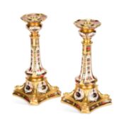 A PAIR OF ROYAL CROWN DERBY IMARI CANDLESTICKS