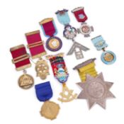 A GROUP OF SILVER MASONIC JEWELS