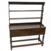 A GEORGE III OAK DRESSER AND RACK