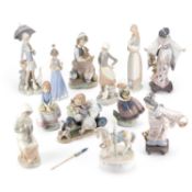 A COLLECTION OF CONTINENTAL PORCELAIN FIGURES