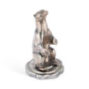 A VINTAGE WHITE-METAL POLAR BEAR CAR MASCOT