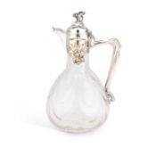 AN ART NOUVEAU SILVER-PLATE MOUNTED GLASS CLARET JUG