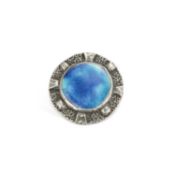 AN ARTS AND CRAFTS PEWTER AND ENAMEL POTTERY BROOCH