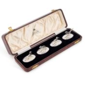 A SET OF FOUR GEORGE VI SCOTTISH SILVER MENU HOLDERS