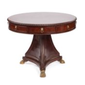 A REGENCY STYLE MAHOGANY DRUM TABLE