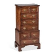 A PERIOD STYLE OAK MINIATURE TALLBOY