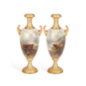 A PAIR OF ROYAL WORCESTER PORCELAIN VASES