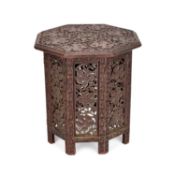 AN ANGLO-INDIAN CARVED HARDWOOD OCCASIONAL TABLE