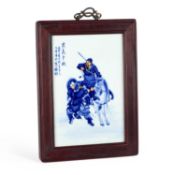 A CHINESE UNDERGLAZE-BLUE AND ENAMELLED PORCELAIN PLAQUE