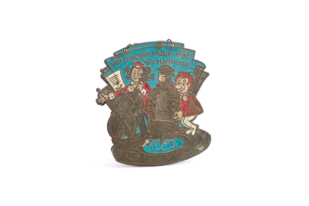 A GERMAN KARNIVAL CAST-METAL ‘ORDEN’ MID 20TH CENTURY