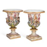 A PAIR OF CONTINENTAL PORCELAIN CAMPANA VASES