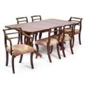 AN EARLY 19TH CENTURY MAHOGANY TWIN-PEDESTAL DINING TABLE