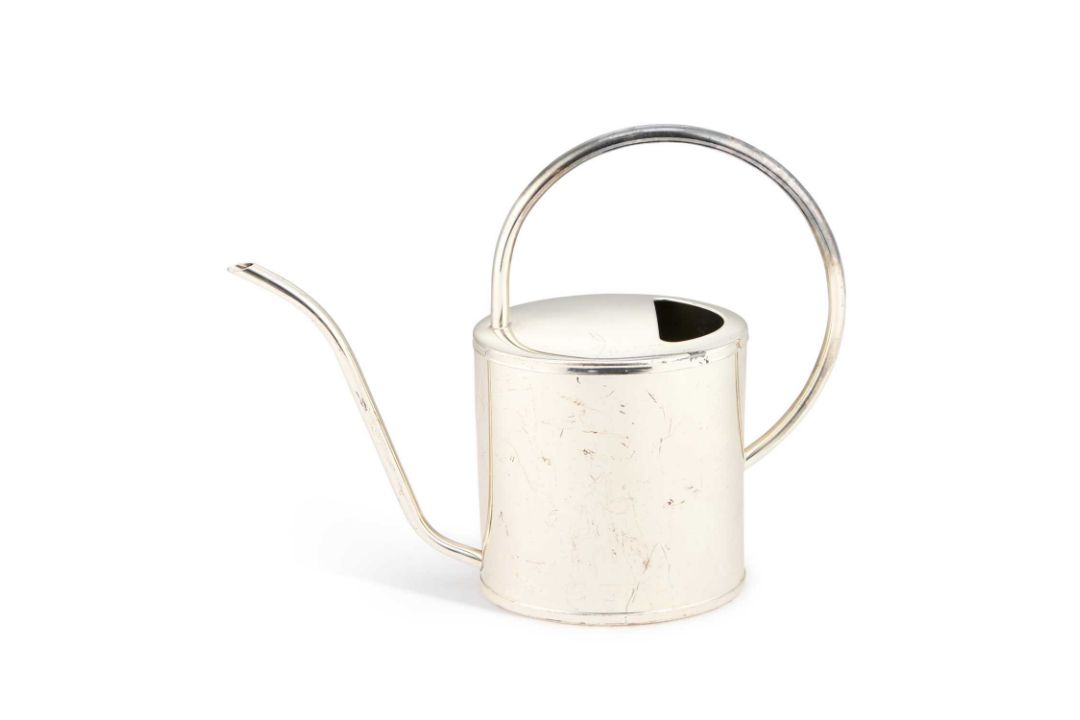A LARGE SILVER-PLATED WATERING CAN
