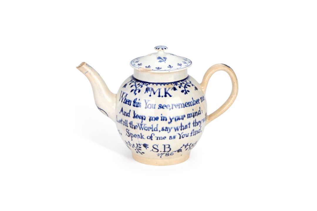 A LEEDS BLUE AND WHITE PEARLWARE MARRIAGE TEAPOT DATED 1786 - Image 1 of 2