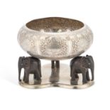 A LATE 19TH CENTURY CEYLONESE SILVER BOWL ON ELEPHANT STAND