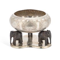 A LATE 19TH CENTURY CEYLONESE SILVER BOWL ON ELEPHANT STAND