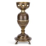 A LATE 19TH/ EARLY 20TH CENTURY INDIAN BRASS AND DAMASCENED OIL LAMP BASE