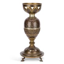 A LATE 19TH/ EARLY 20TH CENTURY INDIAN BRASS AND DAMASCENED OIL LAMP BASE
